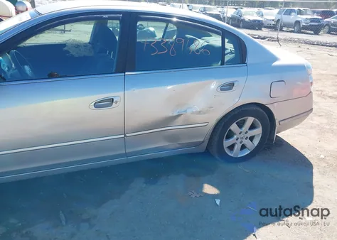 2002 Nissan Altima 2.5 S из США, поврежденный, VIN 1N4AL11E22C209792